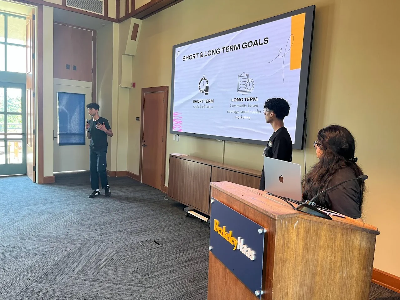 A group of students presenting at the June 2023 Rising C-Suites Business Hackathon